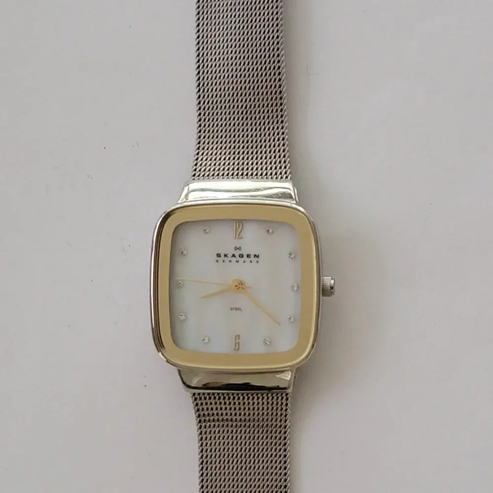 Skagen Womens Watch White Dial Silver Case Gold Bezel Mesh Bracelet Stainless
